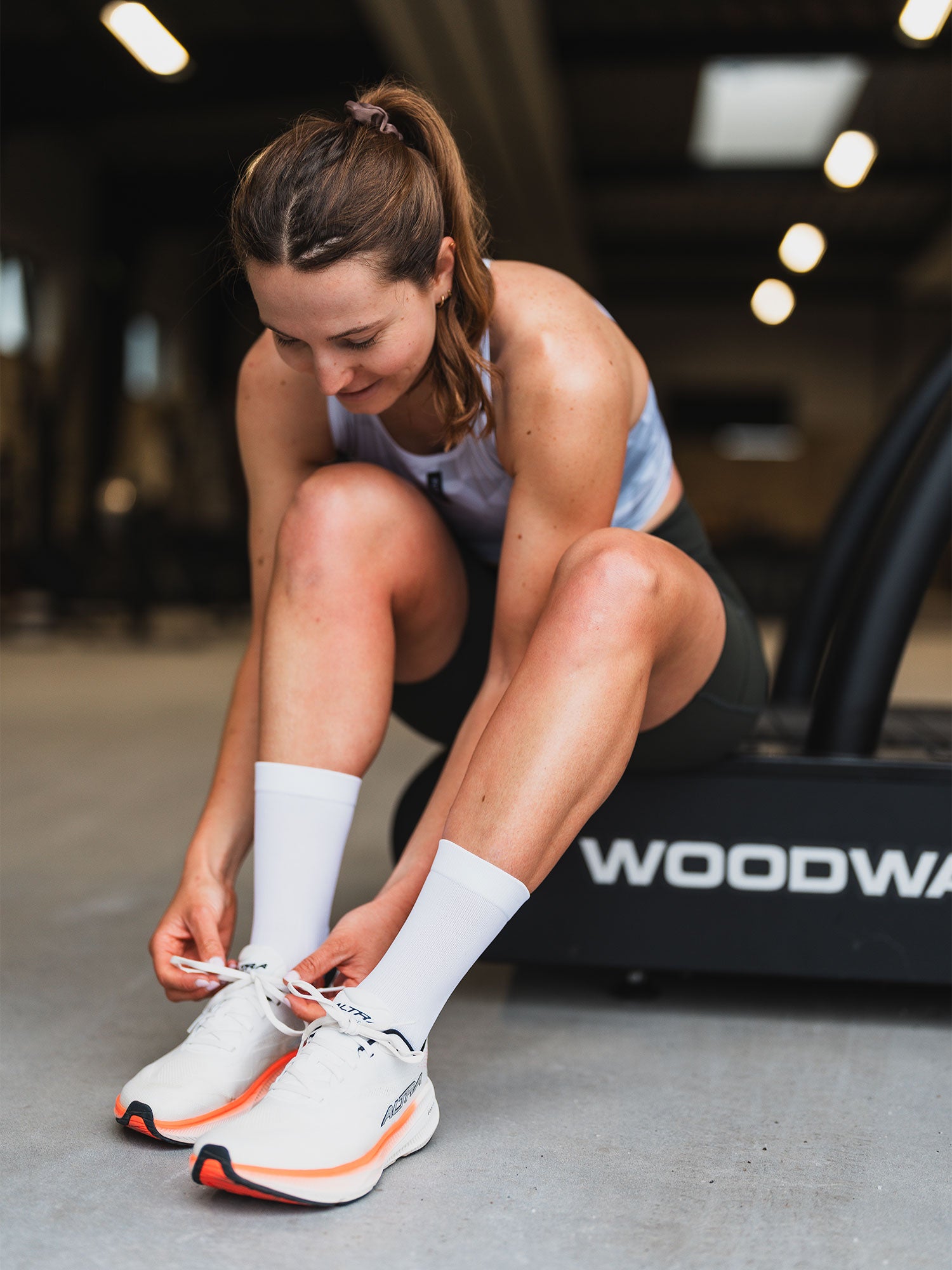 Athlete wearning Fusion white running socks