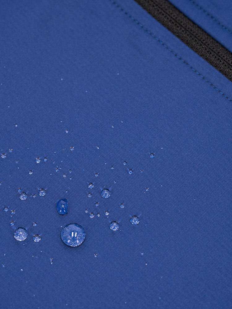 Fusion Women's S1 Run Jacket in Night blue showing water repellent fabric