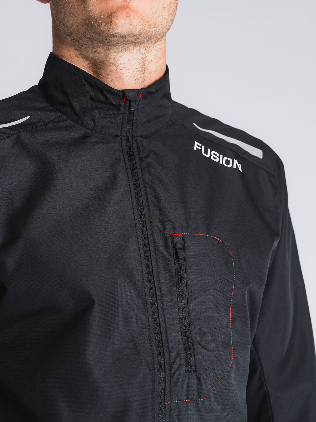 Fusion S1 Run Jacket in Black with front pocket