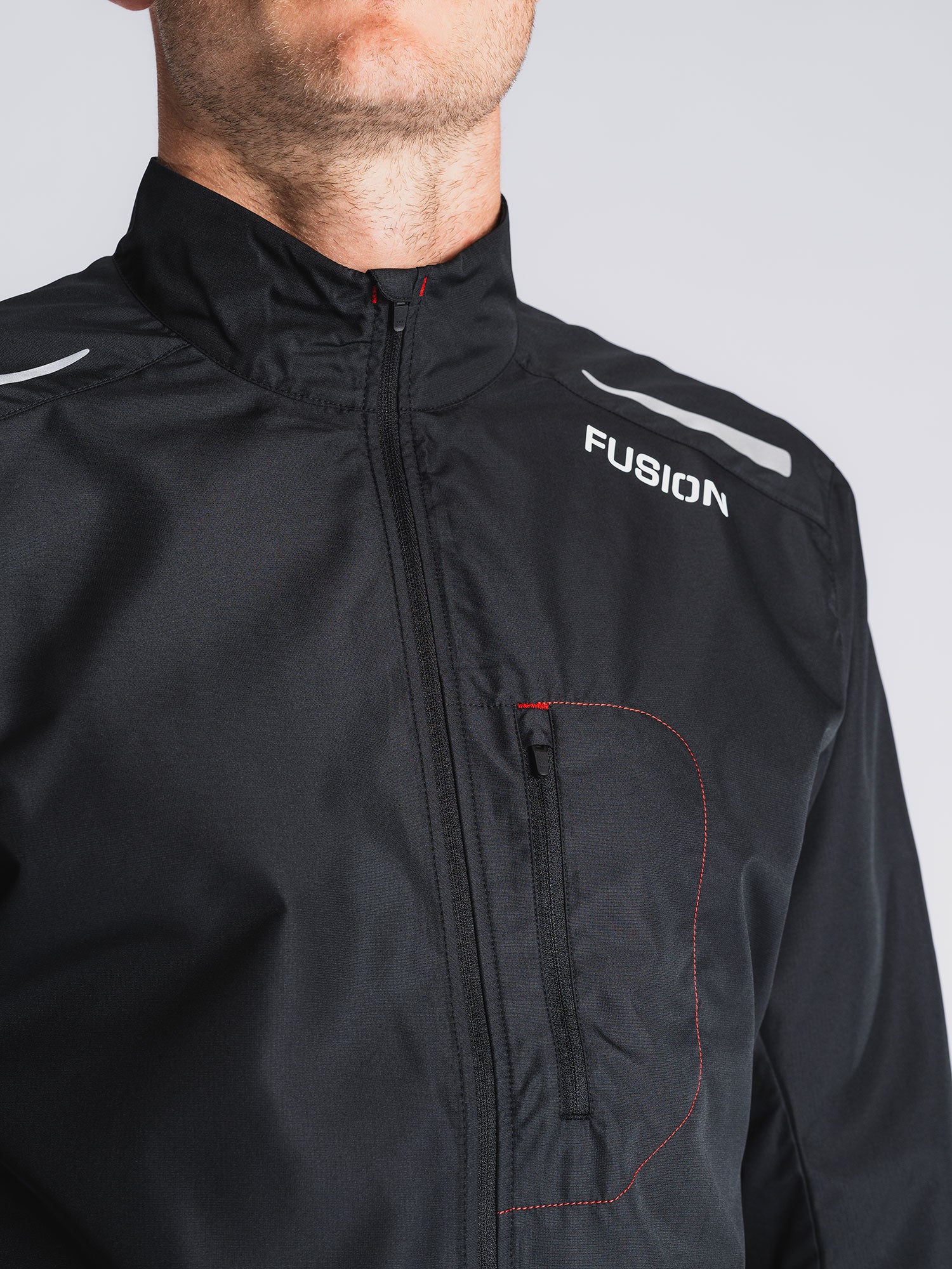Fusion S1 Run Jacket in Black with front pocket