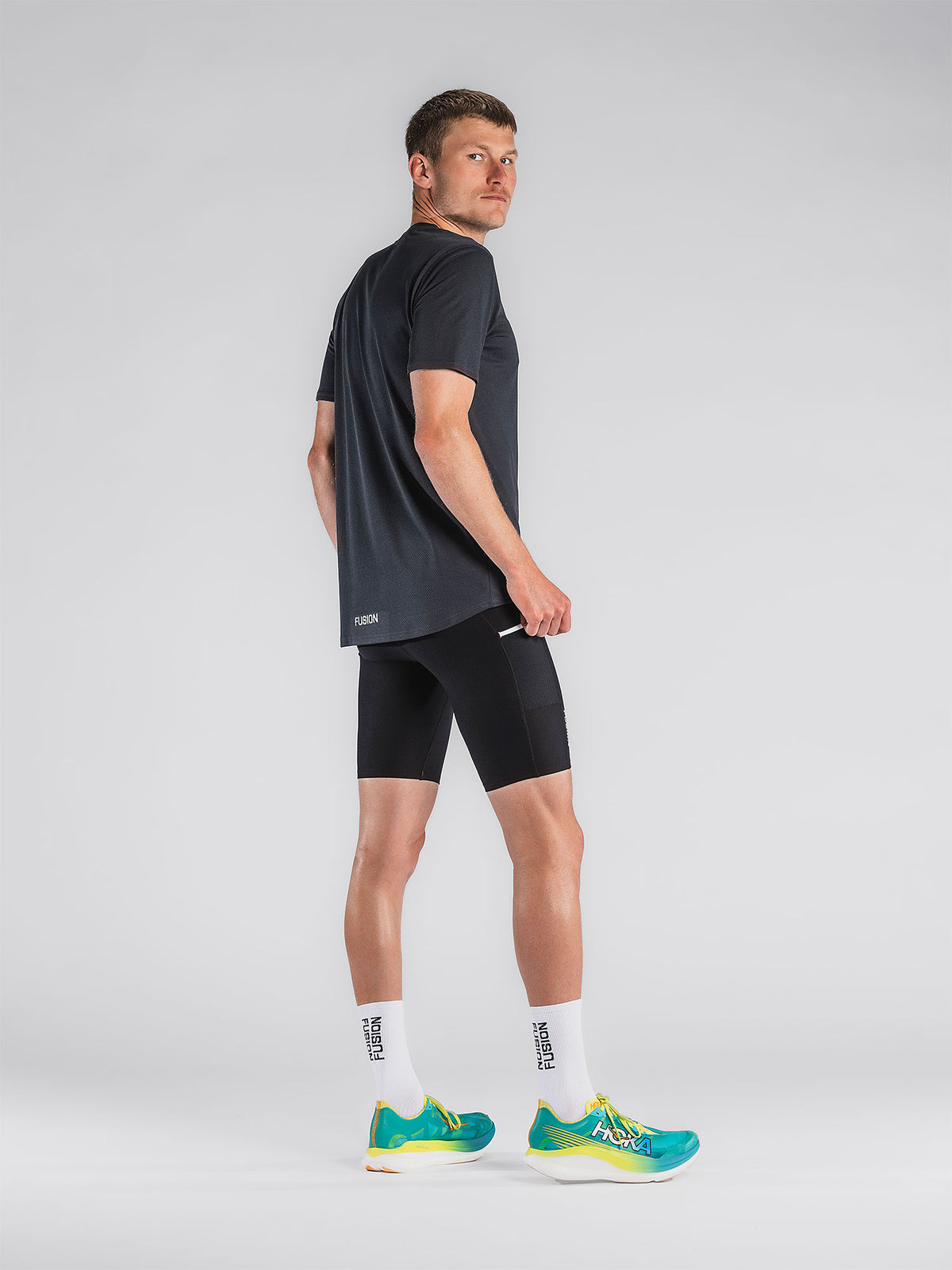 FUSION Men s Short Run Tights with pockets FM Sports