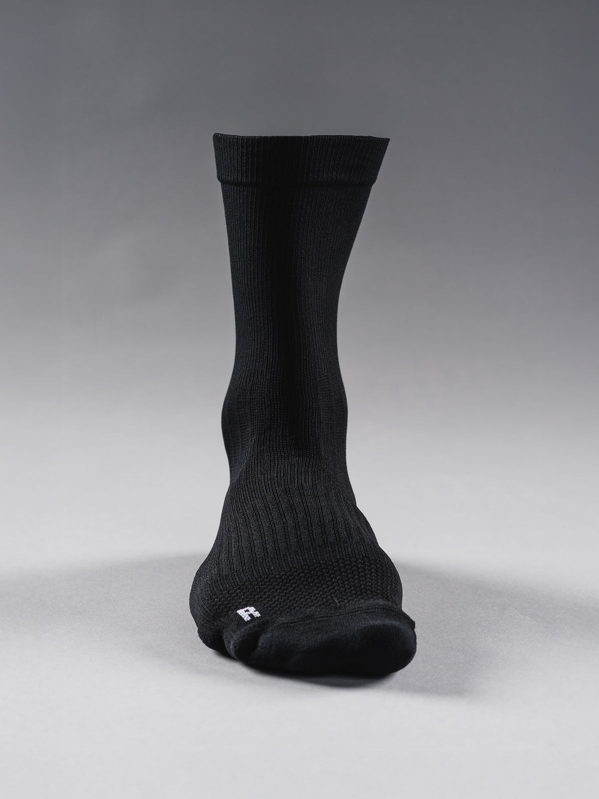 Fusion running sock in black with left and right specific socks for better fit and comfort