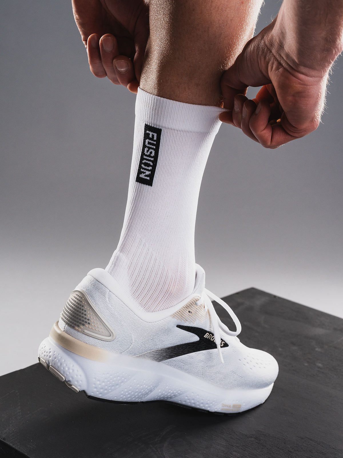 Running sock from Fusion in white with extra reinforced yarn in heel and toe box for comfort and durability