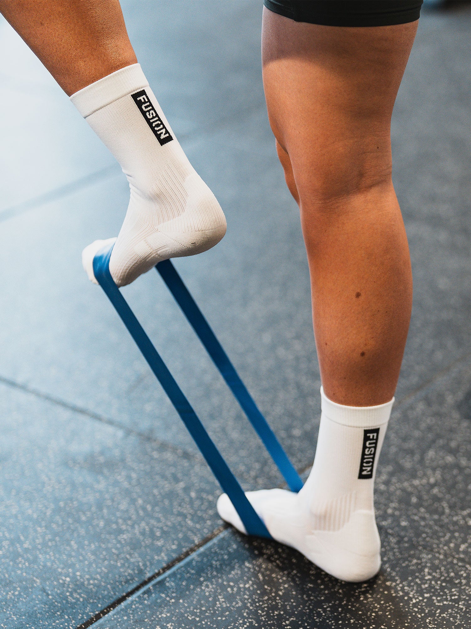 Womens running sock in white with targeted zones in heel and toe