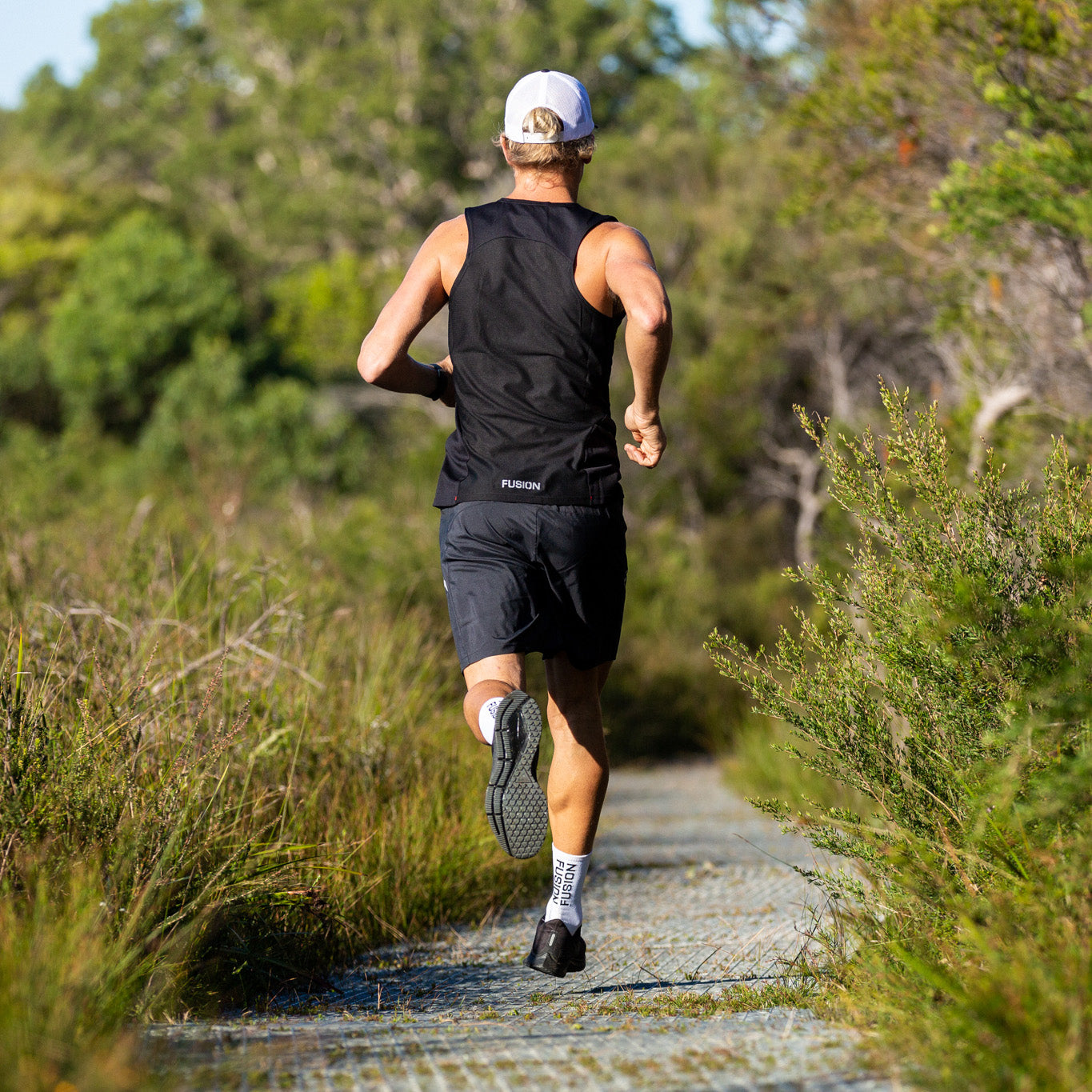 Fusion Trucker Cap_Black/White_Collection: Mens_Action