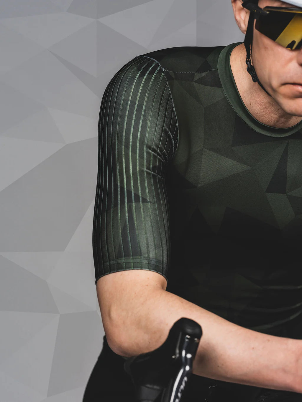 Fusion's new TEMPO! Cycle Jersey in Green showing sleeve speed fabric